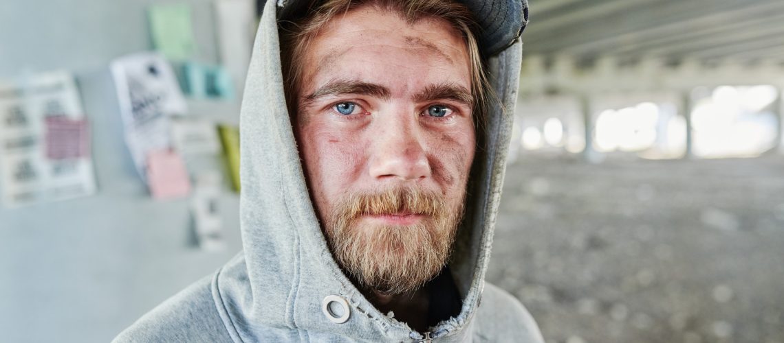 homeless-man-in-torn-clothes